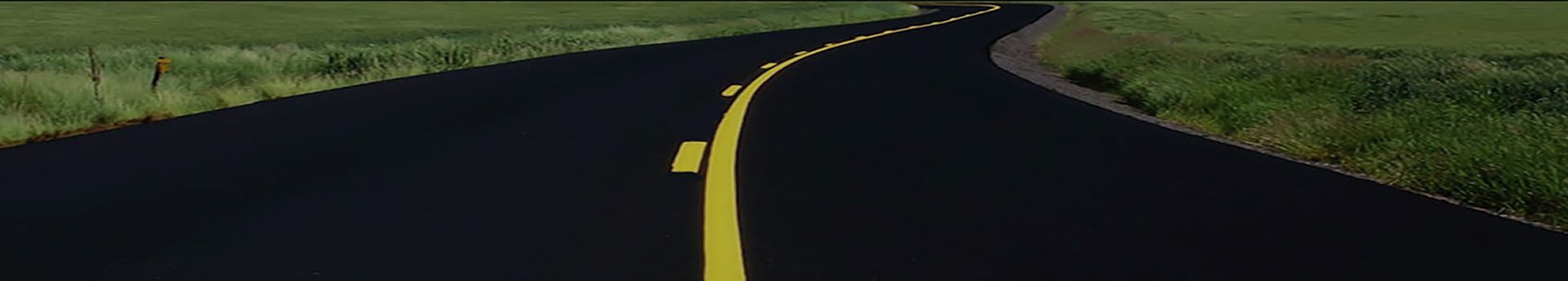 A road with yellow lines on it